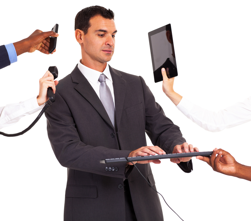 Business man multitasking